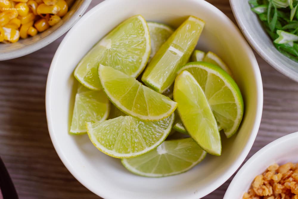 lime wedges arroz caldo topping