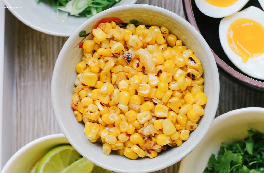 spicy corn arroz caldo topping