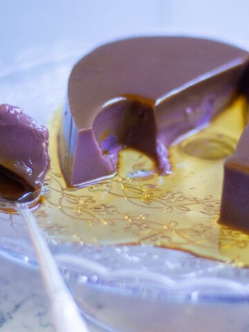 ube leche flan with spoon