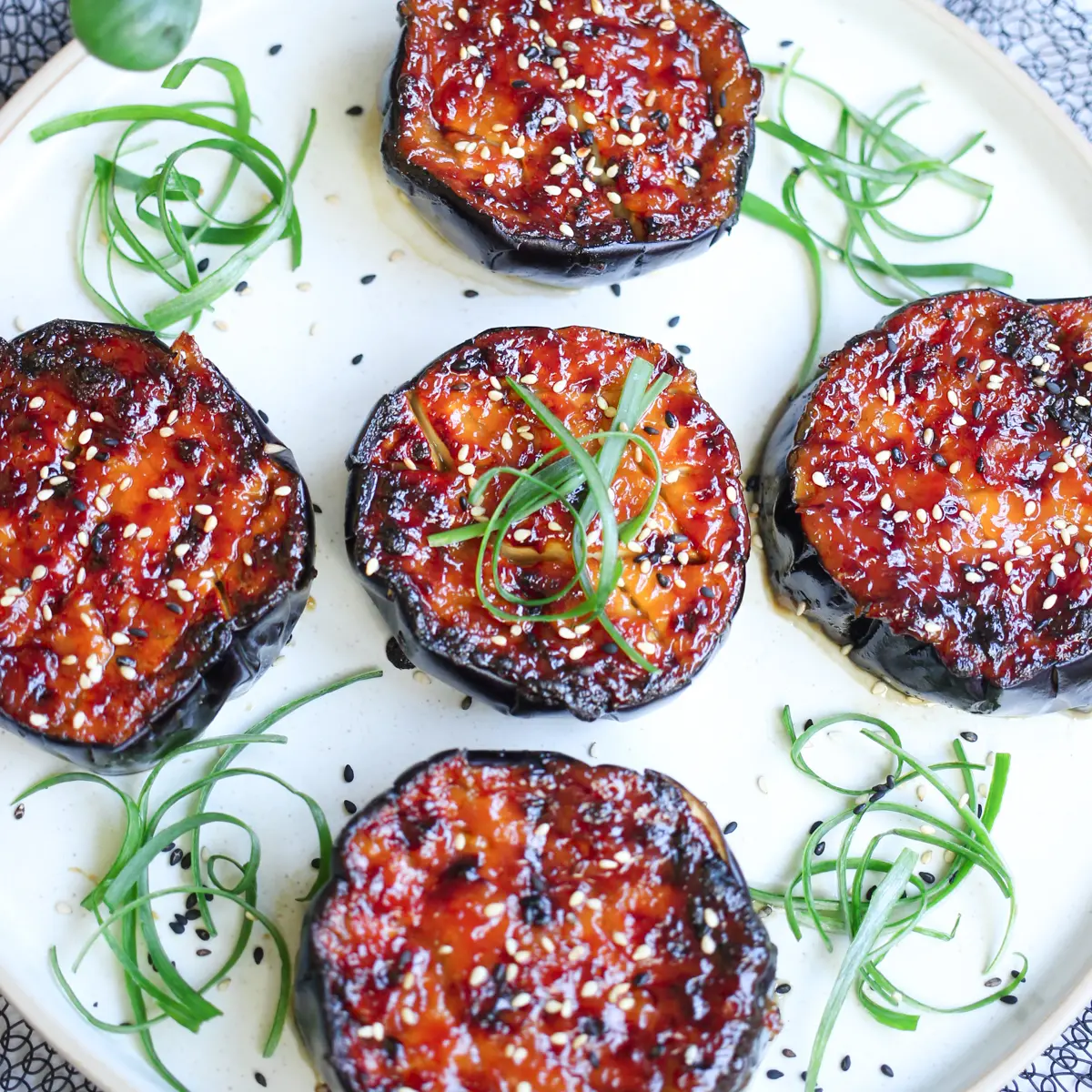 Miso eggplant recipe prepared, sliced, and plated with garnish