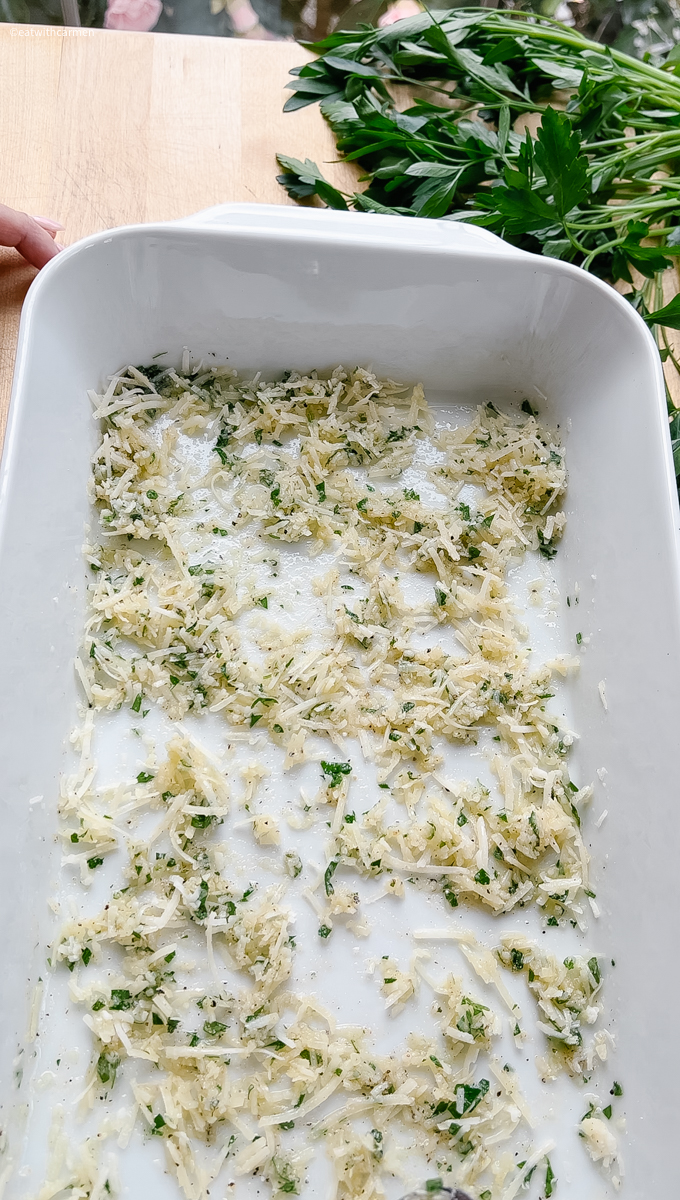 cauliflower recipe, spread out parmesan cheese with parsley, olive oil, salt and pepper 