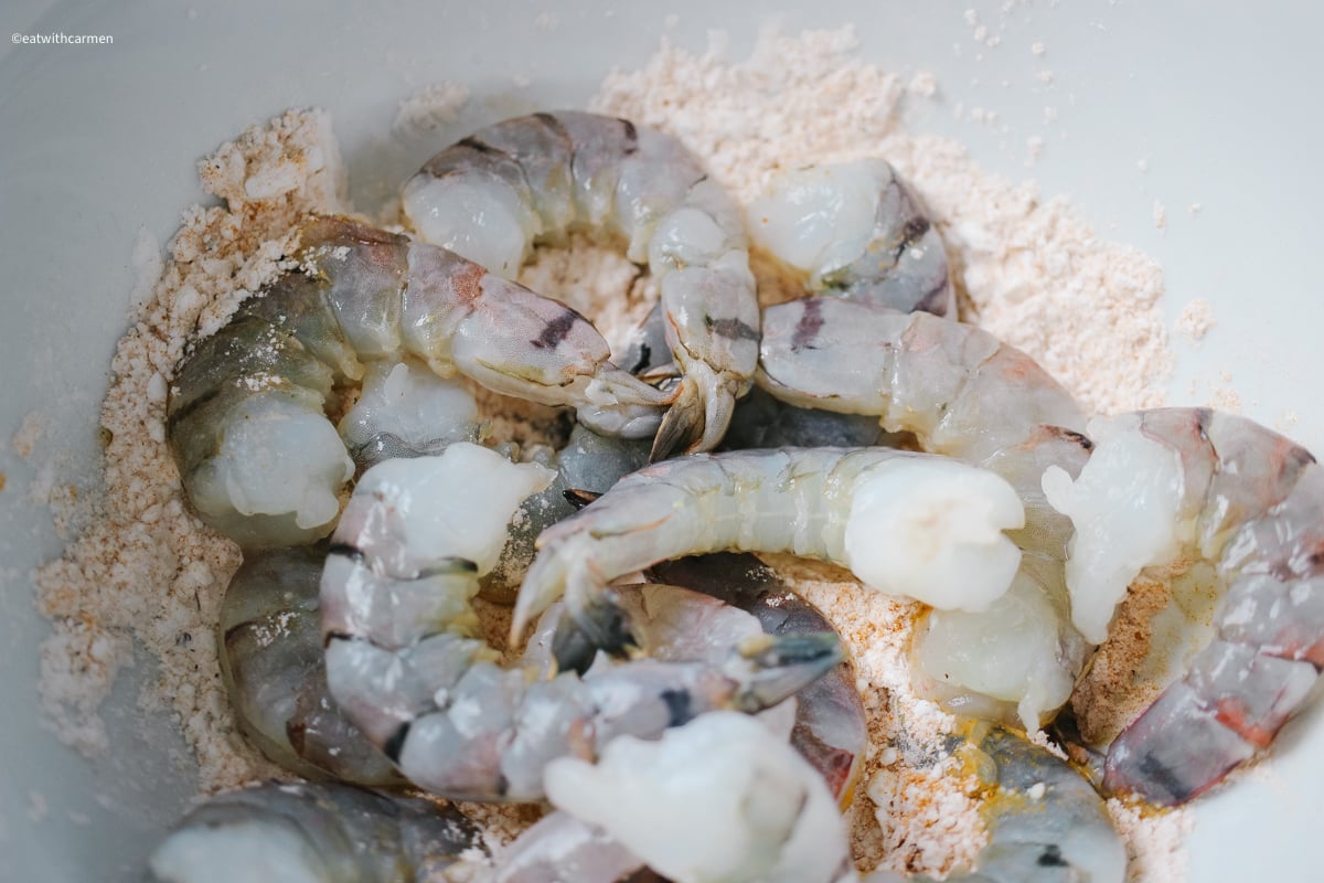 lightly coat the prawns