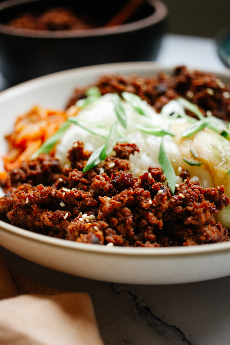 beef bulgogi with rice, kimchi and cucumber salad