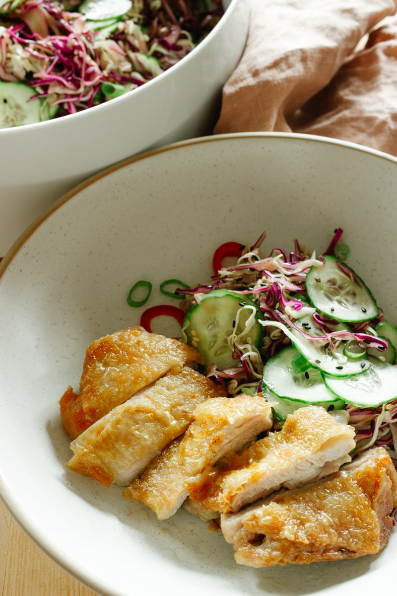 Asian coleslaw with pan fried chicken
