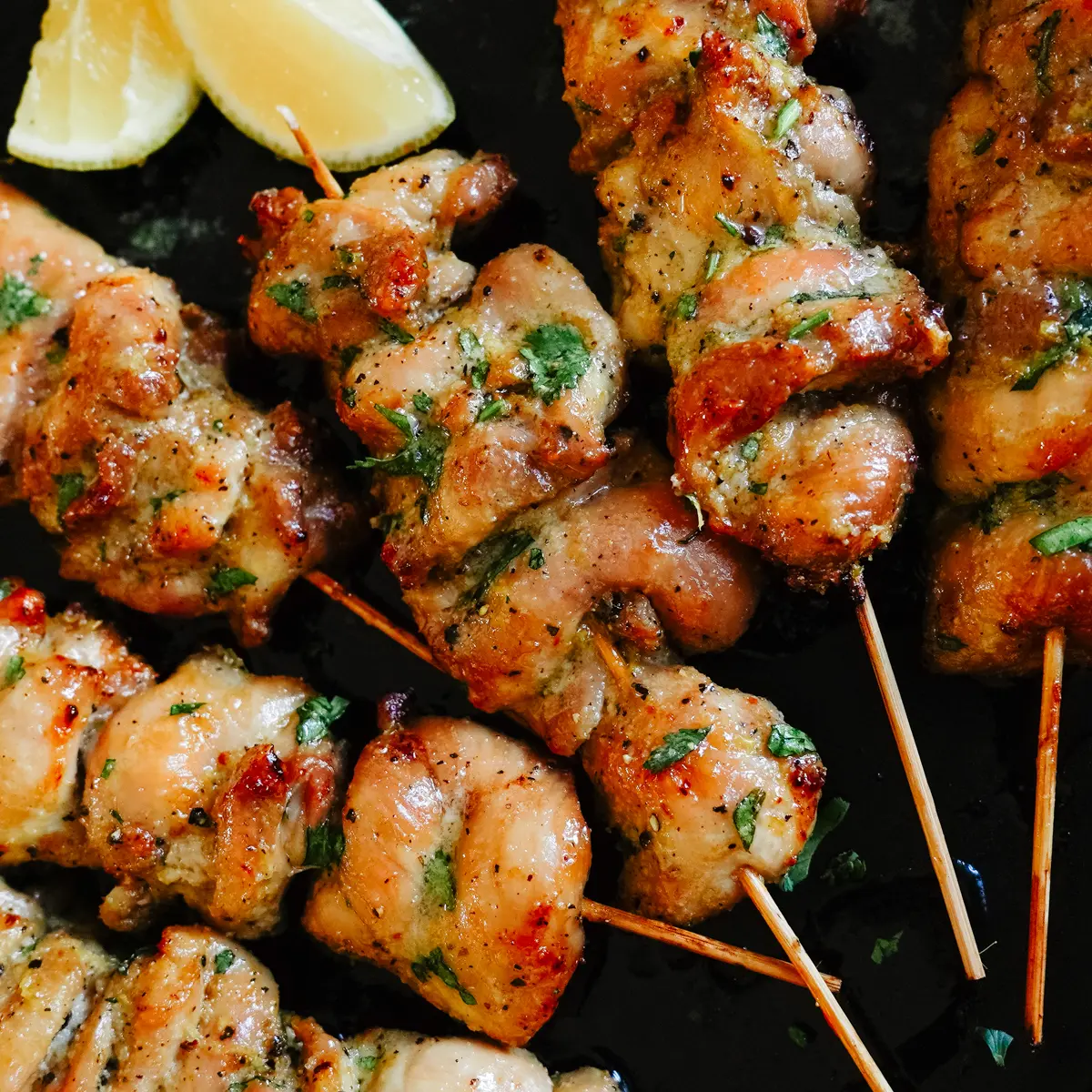 Close up image of the Best-Ever Lemon Butter Air Fryer Chicken Skewers (Kabobs) recipe