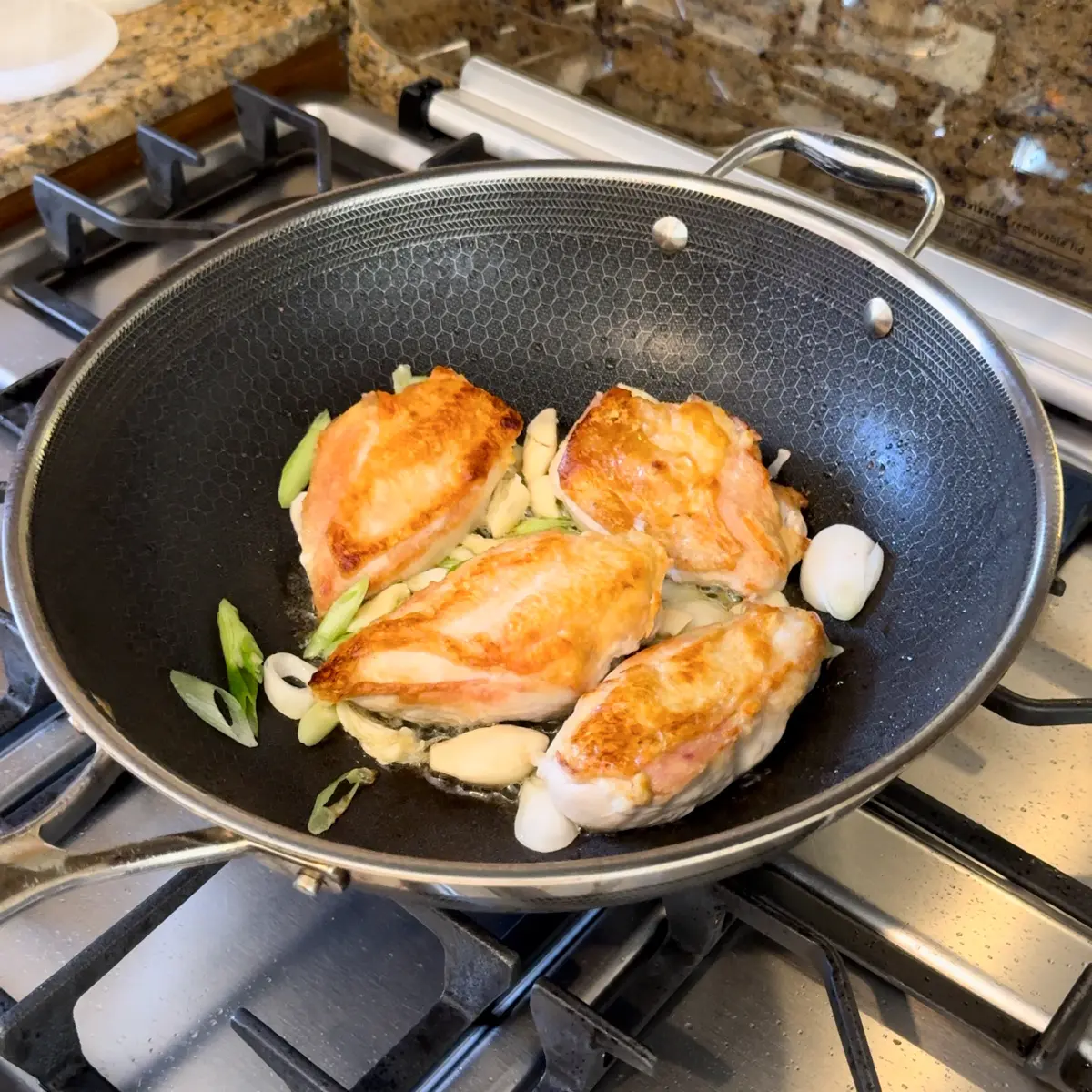 pan fry the chicken for chicken rice bowl