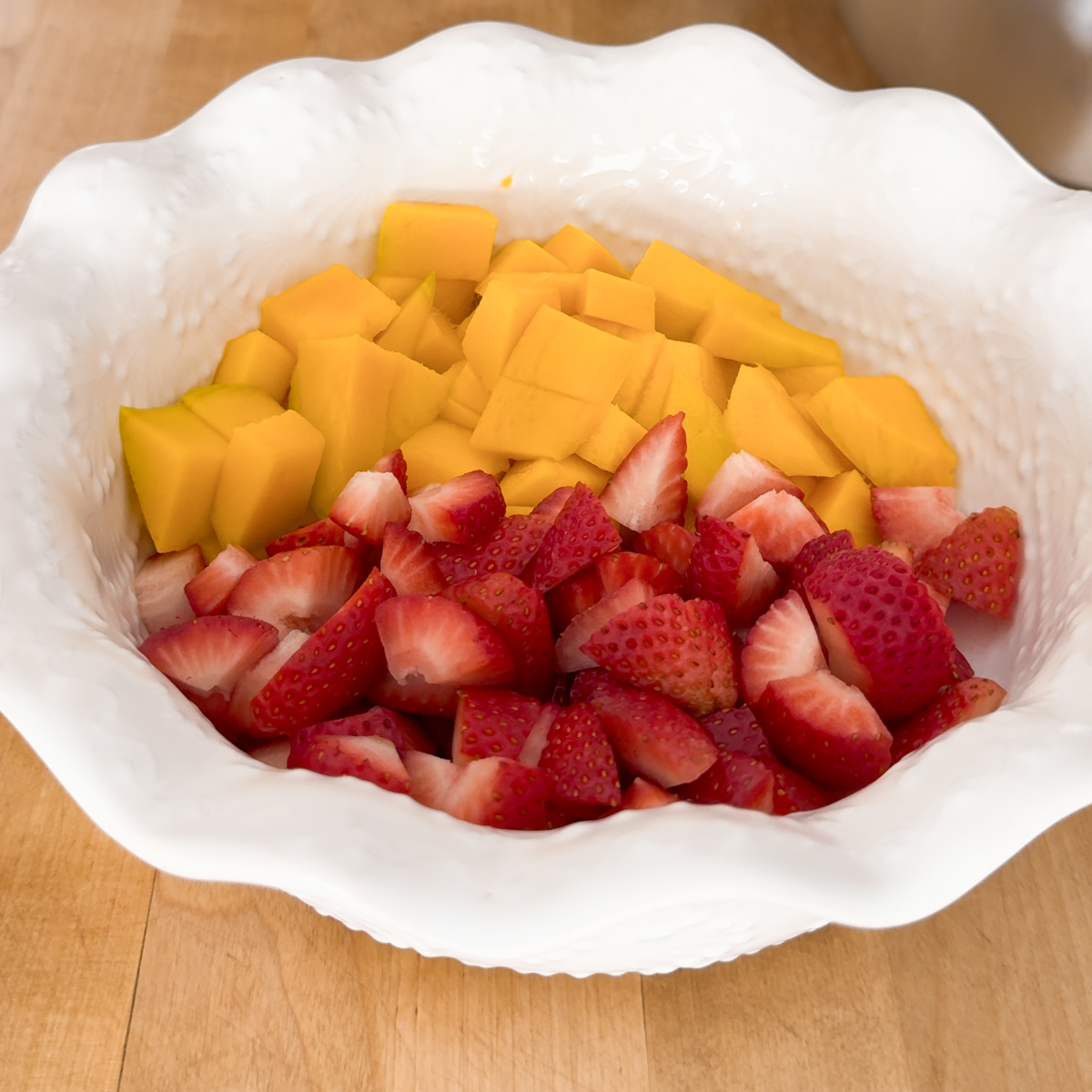 cut the mango and strawberry sago