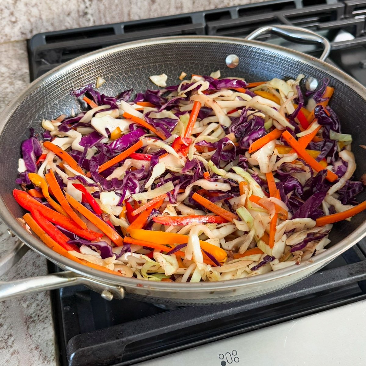 saute the vegetables. filipino chicken pancit